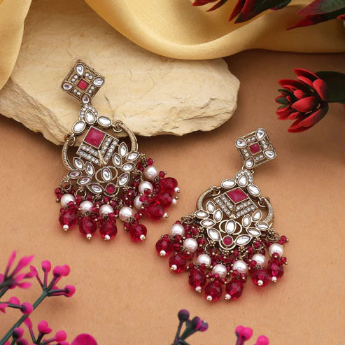 Beautiful Rani Color Kundan Earrings With Floral Design For Wedding Occasions