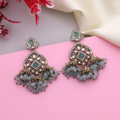 Beautiful Firozi Color Kundan Earrings With Sparkling Stones Perfect For Bridal Wear