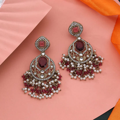 Elegant Magenta Color Kundan Earrings With Stylish Festive Appeal