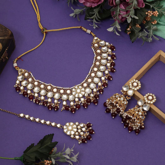 Elegant Maroon Color Meena Work Kundan Necklace Set Designed For Weddings And Traditional Celebrations