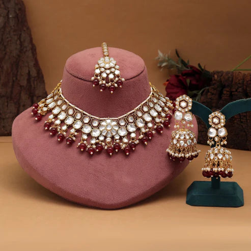 Elegant Maroon Color Meena Work Kundan Necklace Set Designed For Weddings And Traditional Celebrations