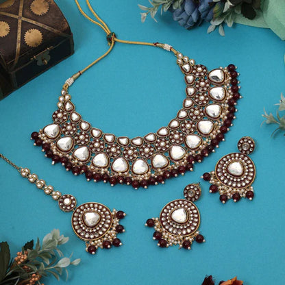 Gorgeous Maroon Color Meena Work Kundan Necklace Set Designed With Artistic Detailing For Brides