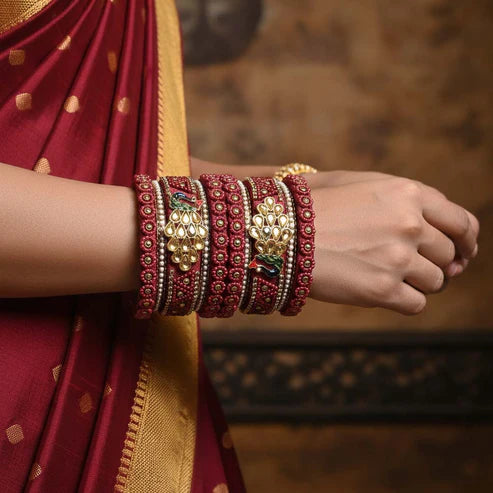 https://femnari.com/products/maroon-color-peacock-inspired-1-set-of-thread-bangle-size-2-6-trb102mrn-2-6#:~:text=Maroon%20Color%20Peacock%20Inspired%201%20Set%20Of%20Thread%20Bangle%20With%20Traditional%20Handcrafted%20Appeal